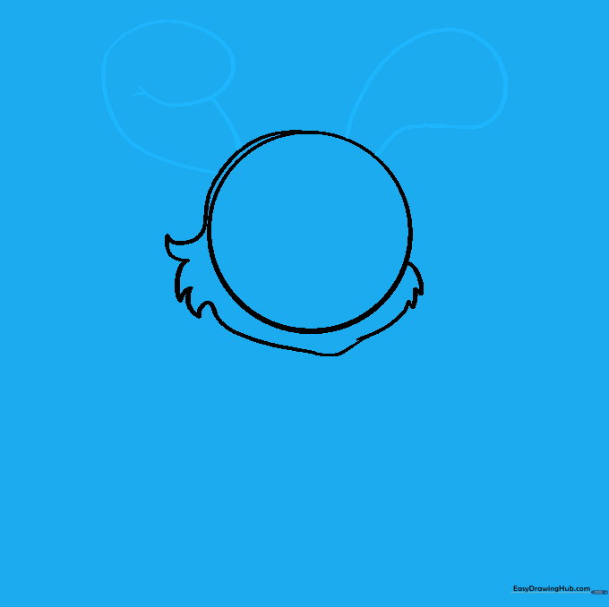 Drawing two long, floppy bunny ears on top of the head outline.