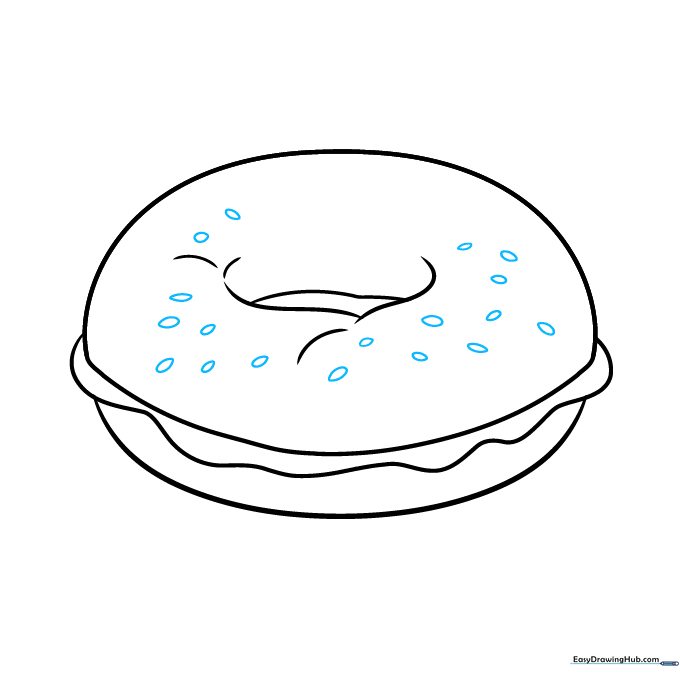 Adding sesame seed details to the top of the bagel using small teardrop shapes.