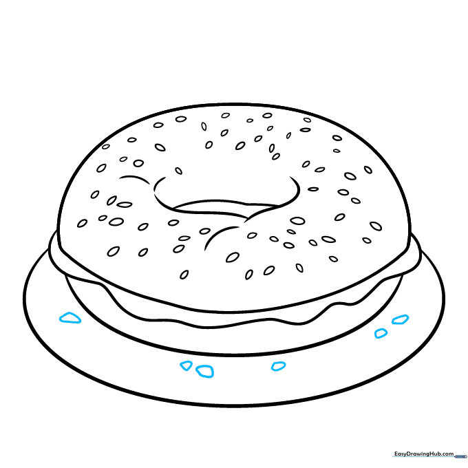 Adding small crumbs on the plate to complete the drawing.