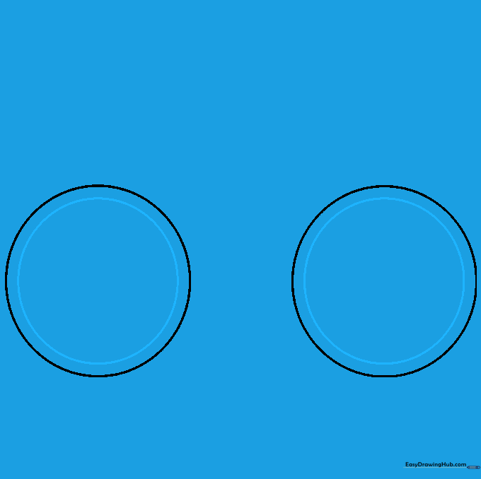 Two circles with smaller circles inside them, creating the appearance of bicycle tires.