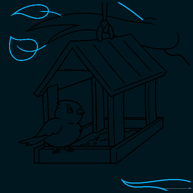 Drawing leaves on the tree branch to frame the bird feeder.
