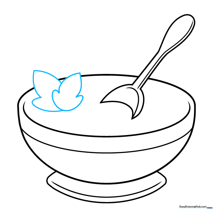 Drawing two small, wavy-edged leaves floating in the soup.