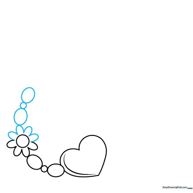Adding 'U' shaped petals to the flower and continuing the bead pattern.