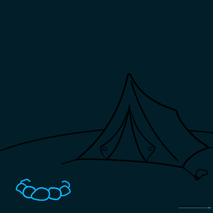 Drawing a ring of rounded stones to create a campfire pit.