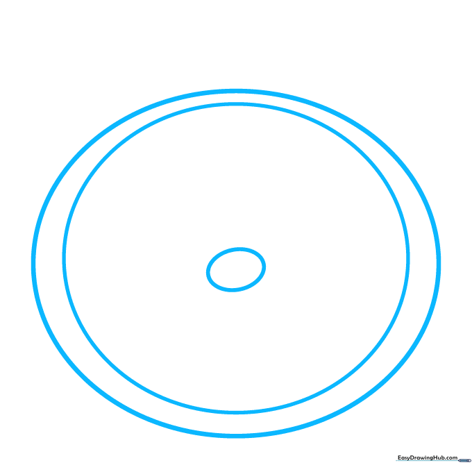 Pencil sketch showing a large circle for the clock face with a small central oval nose.