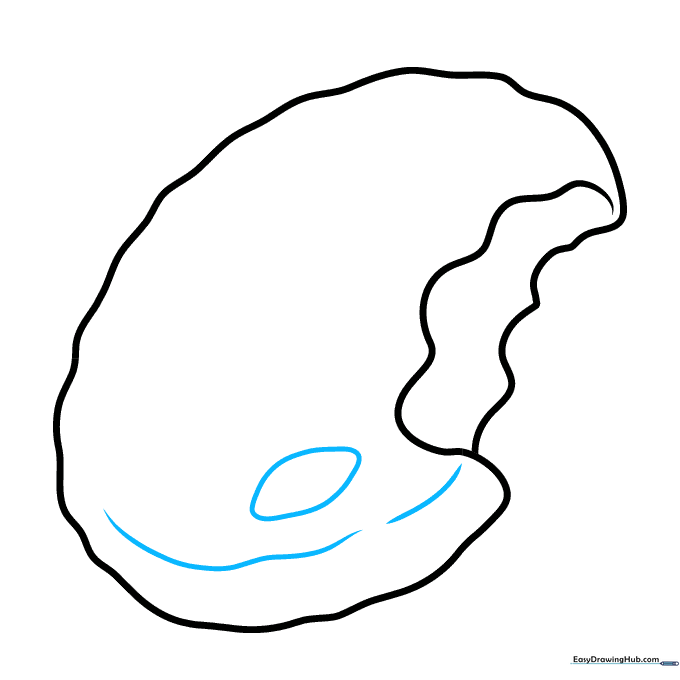 Drawing the first chocolate chip on the surface of the cookie.