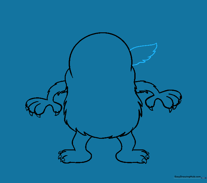 A furry, ear-like shape extending from the side of the monster's head.