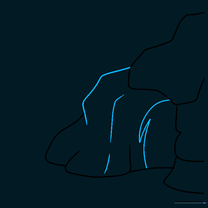 Adding jagged lines to the cave entrance to create a realistic, rough rock texture.