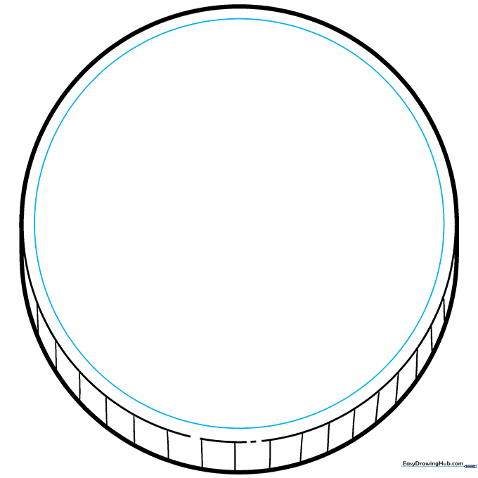 A smaller circle drawn inside the main coin shape to serve as the center design area.
