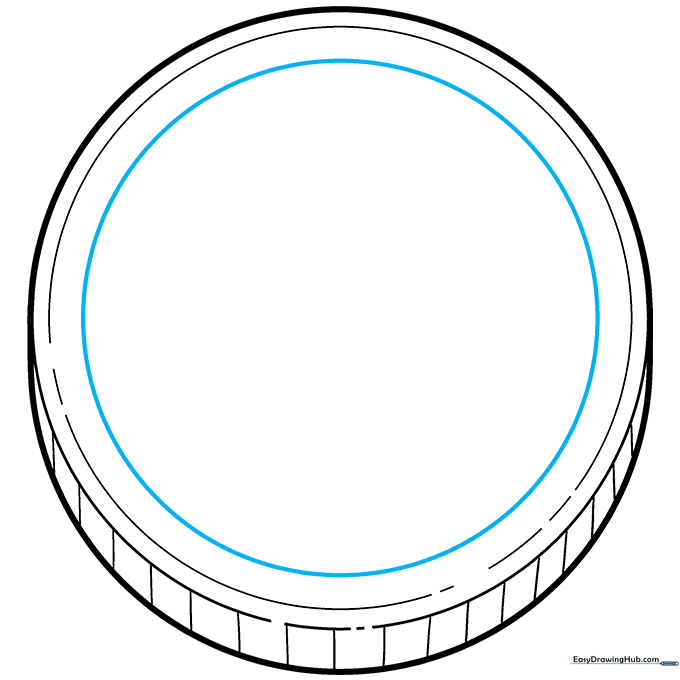 Inner circle refined with a smaller circle inside to create a ringed design.