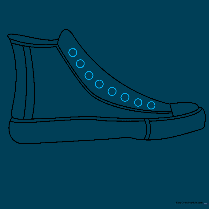 Adding small circles along the side of the tongue to represent lace eyelets.