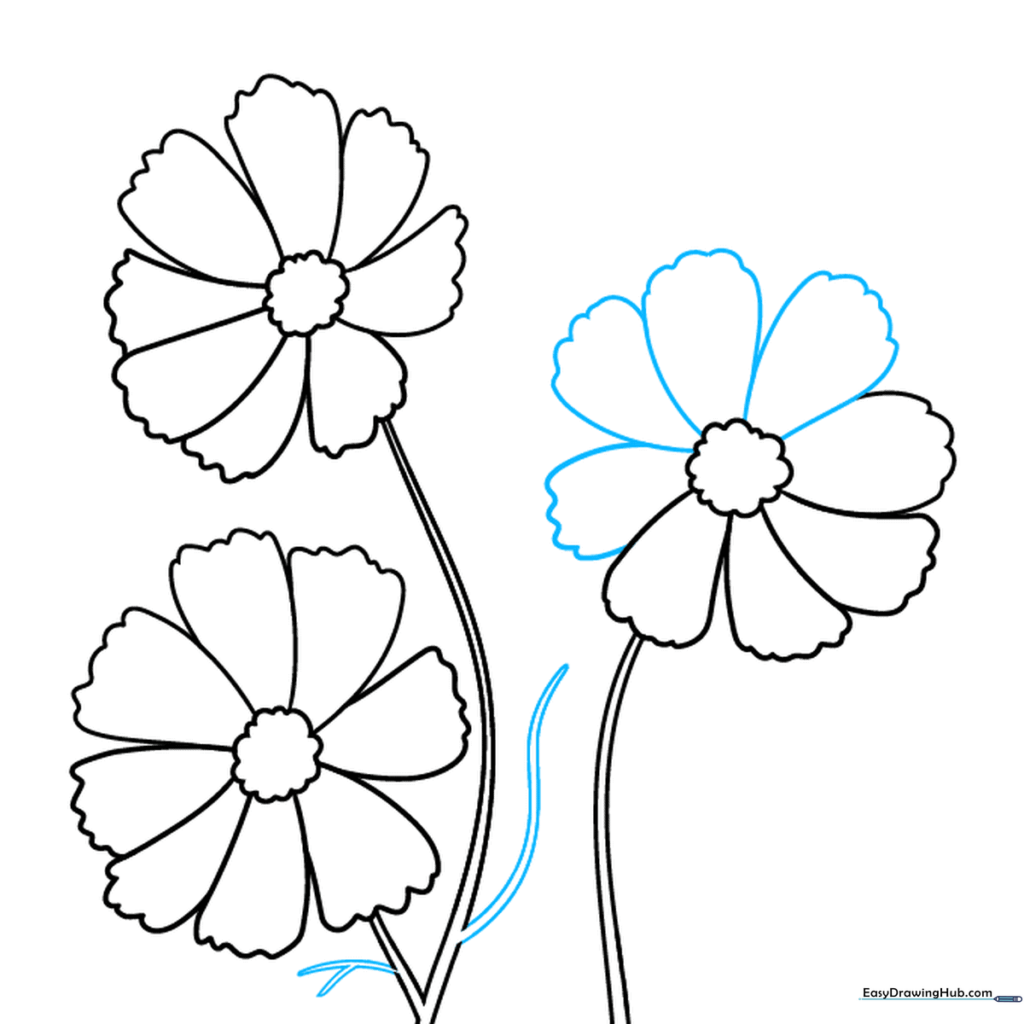 Adding feathery, Y-shaped leaves to the cosmos stems.