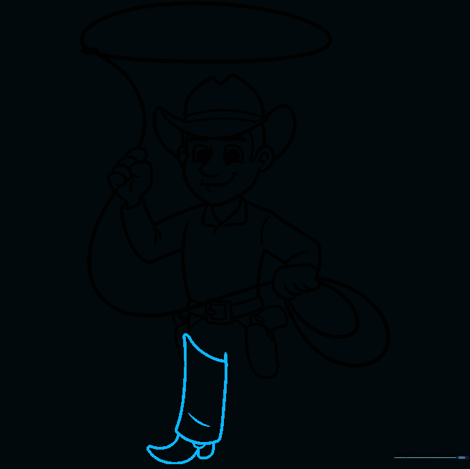 Lower body of the cowboy showing chaps and a boot