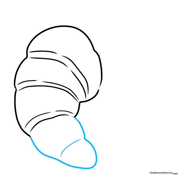 The rounded end of the croissant being drawn with a folded line detail.