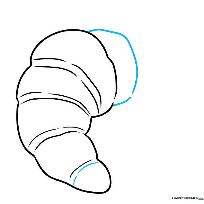 Drawing the opposite side of the croissant to create the signature crescent shape.