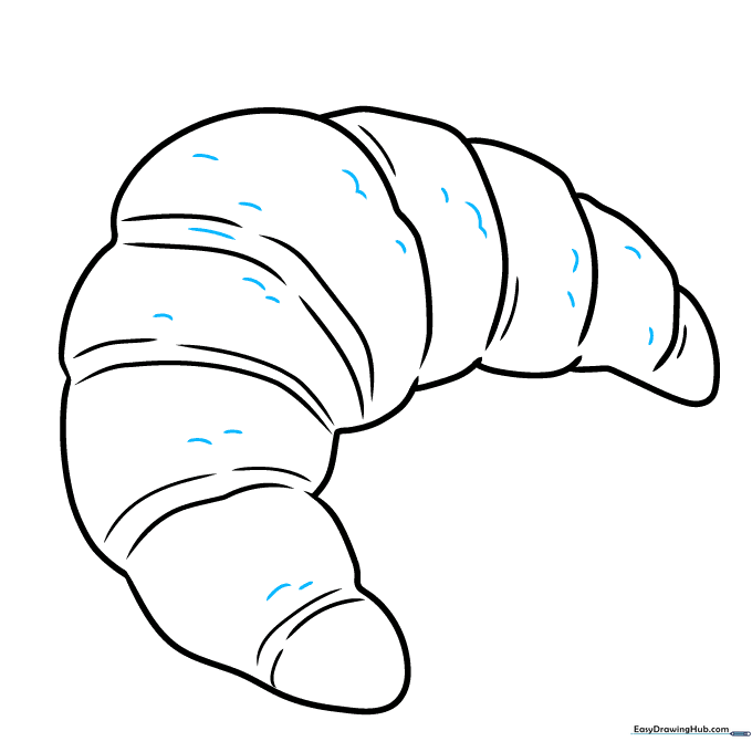 Finalizing the croissant outline with additional texture lines for a realistic look.