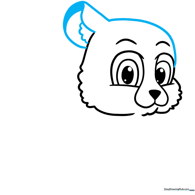 Outlining the top of the cheetah's head and adding a detailed ear with a fur tuft.