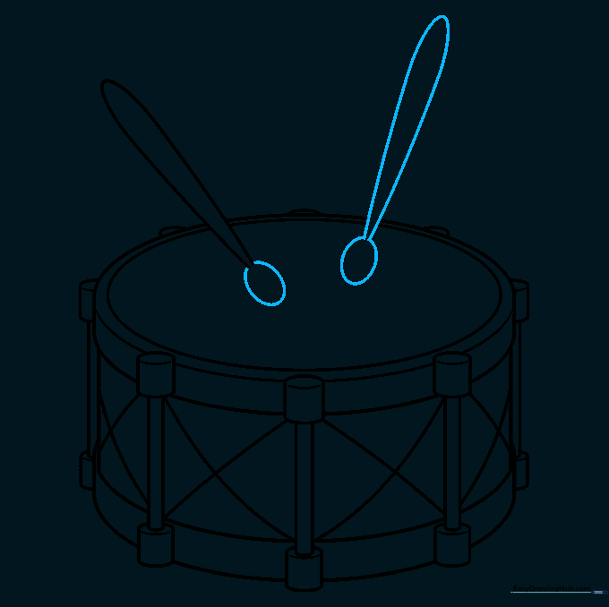 Adding the second drumstick to complete the pair.