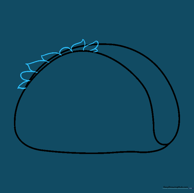 Adding wavy, organic shapes to the top of the taco to represent lettuce leaves.