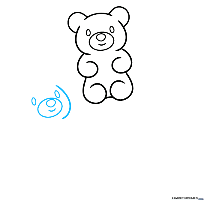Sketching the facial features for a second gummy bear character.
