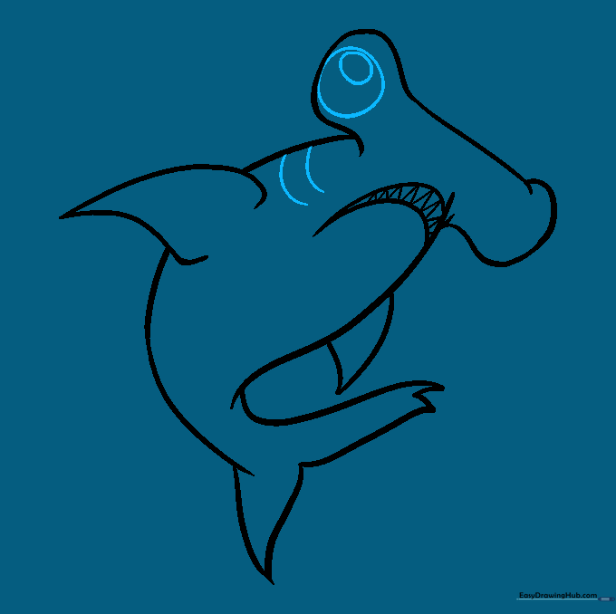 Drawing the eyes on the hammerhead and adding gill slits.
