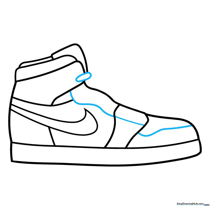 Adding texture lines and the tongue detail to the sneaker drawing.