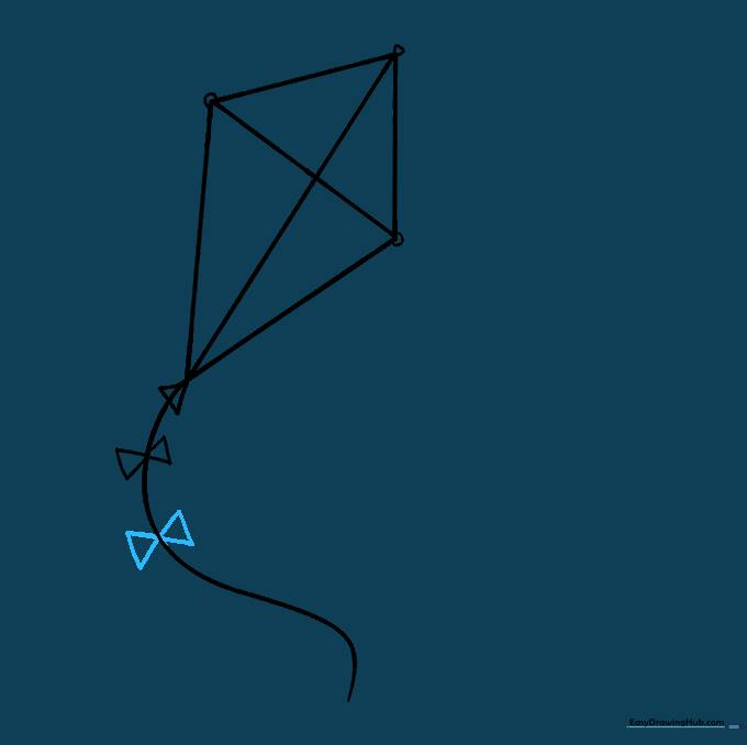 Kite tail showing two decorative bows attached to the string.