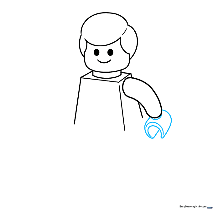 Detailing the C-shaped hand and wrist of the Lego minifigure.