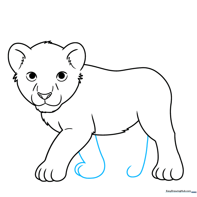 Adding the final paws to the lion cub's body.