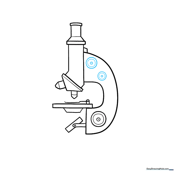 Adding additional fine adjustment knobs to the top of the microscope.