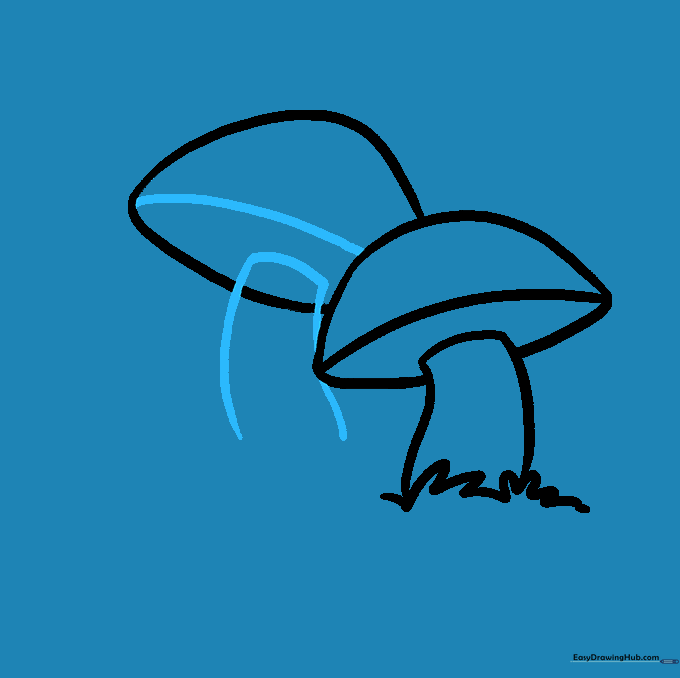 Adding the stem to the second mushroom cap.
