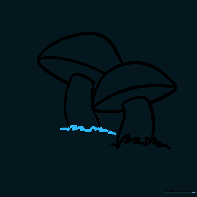 Adding more grass details around the base of the second mushroom.