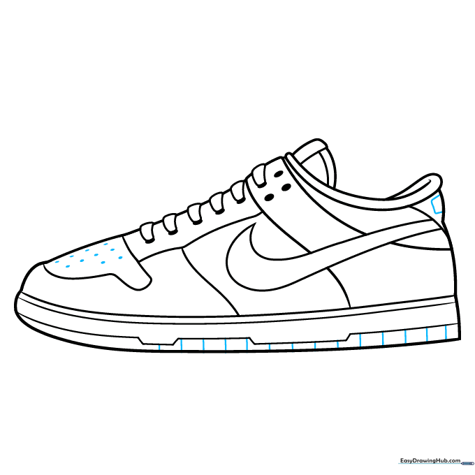 Adding final details like toe perforations and sole tread lines.