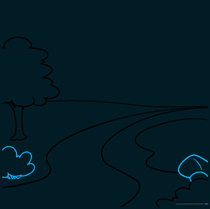Adding small bushes and rock shapes around the edge of the pond.