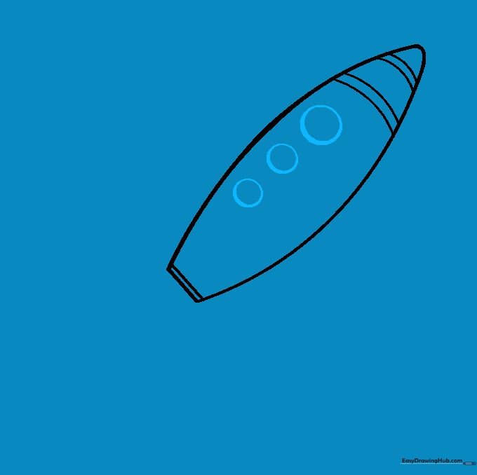 Several circular windows added to the side of the rocket ship.