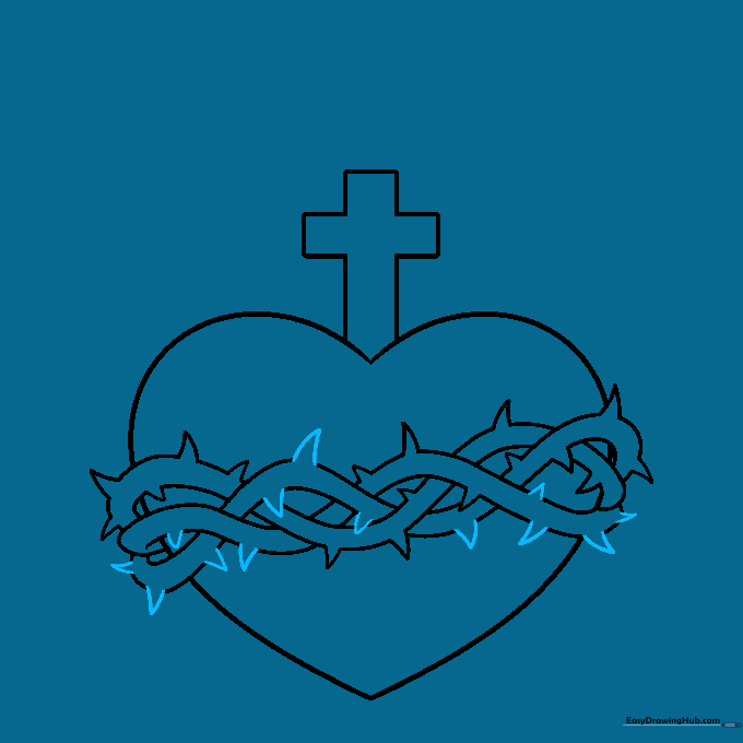 Additional thorns added to complete the wreath design around the heart.