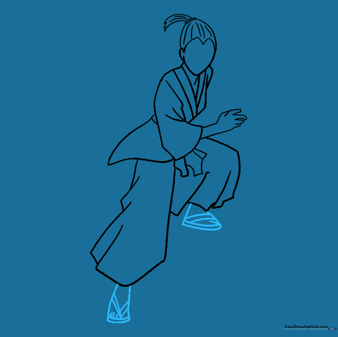 Drawing the feet and traditional sandals at the base of the samurai figure.