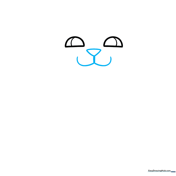 Cat face detail showing a small triangular nose and a rounded mouth line.