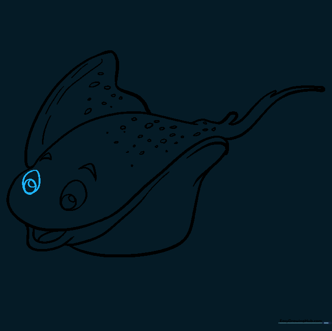 Completing the second eye to match the first, giving the stingray a full face.