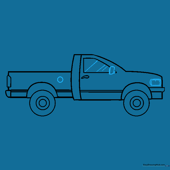 Finalizing the truck with headlights, mirrors, and window details.