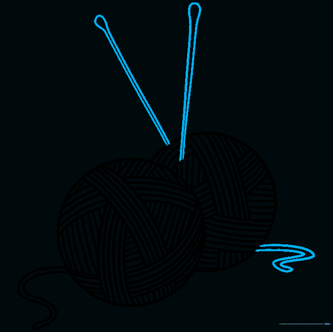 Adding two knitting needles sticking out of the yarn ball for a finished look.