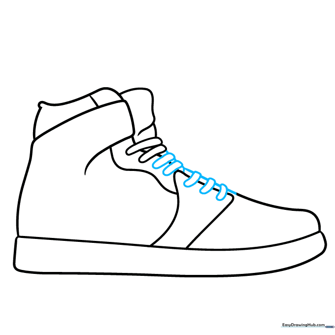 Adding the shoelace details across the top of the sneaker.