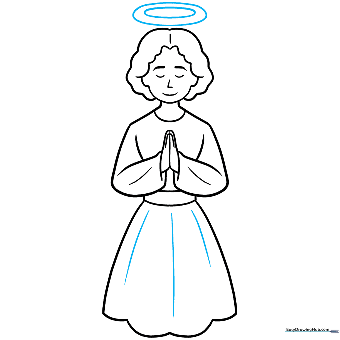 Adding fabric detail to the skirt and a floating halo above the angel's head.