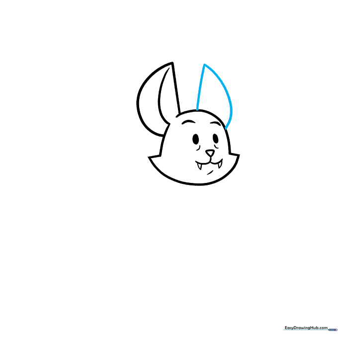 Drawing the second ear to match the first, completing the bat's head silhouette.