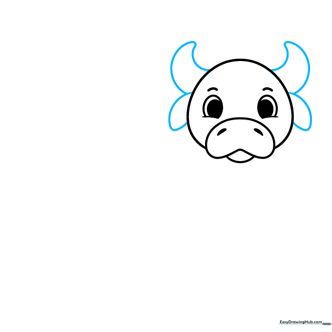 Adding floppy ears and small horns to the top of the cow's head.