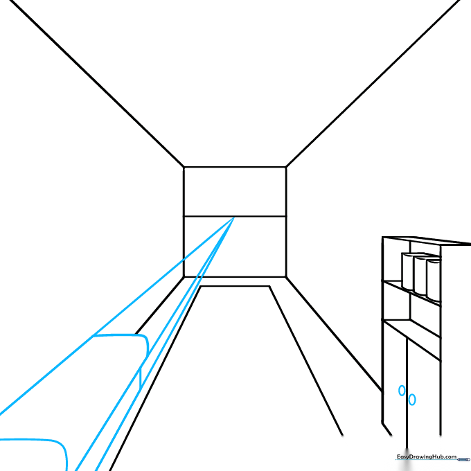 Sketch showing the addition of cabinet knobs and the basic outline of a sofa using perspective lines.