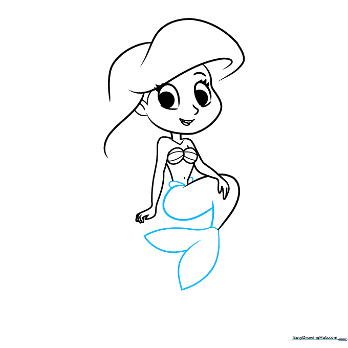 Completing the mermaid tail and adding the fan-shaped flipper.