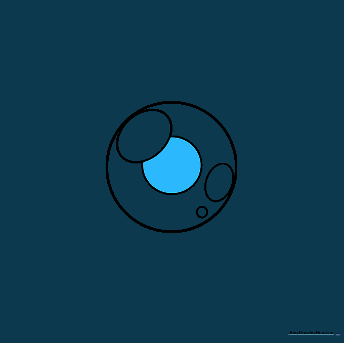 The pupil is now shaded in dark, leaving the highlights untouched.