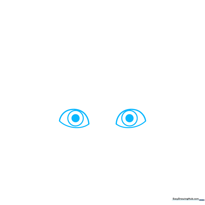 Close-up of two eye shapes with pupils being drawn on white paper.