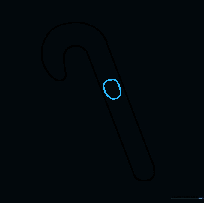 A small, irregular circle drawn in the center of the candy cane to serve as the bow knot.